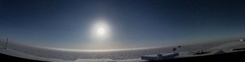 The full moon reflects off the snow and ice on polar plateau